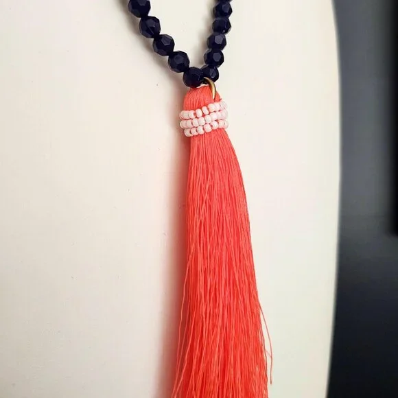 Navy beaded necklace with florescent orange thread tassel - Picture 4 of 12